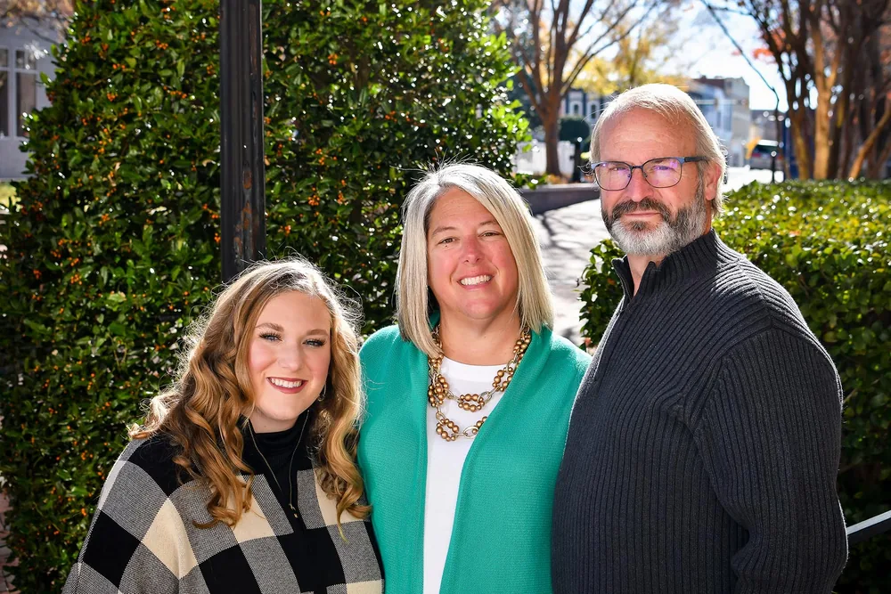 Wendy Maynard with her husband Greg and daughter Madison in downtown Monroe